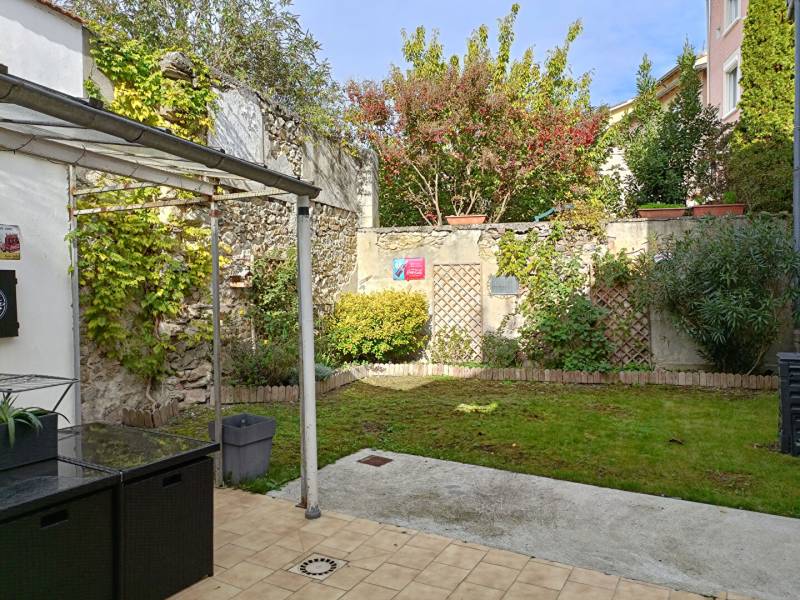 Maison de ville T3 94 m² avec jardin et garage à Pont-Evêque