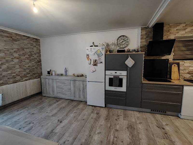 Maison de ville T3 94 m² avec jardin et garage à Pont-Evêque