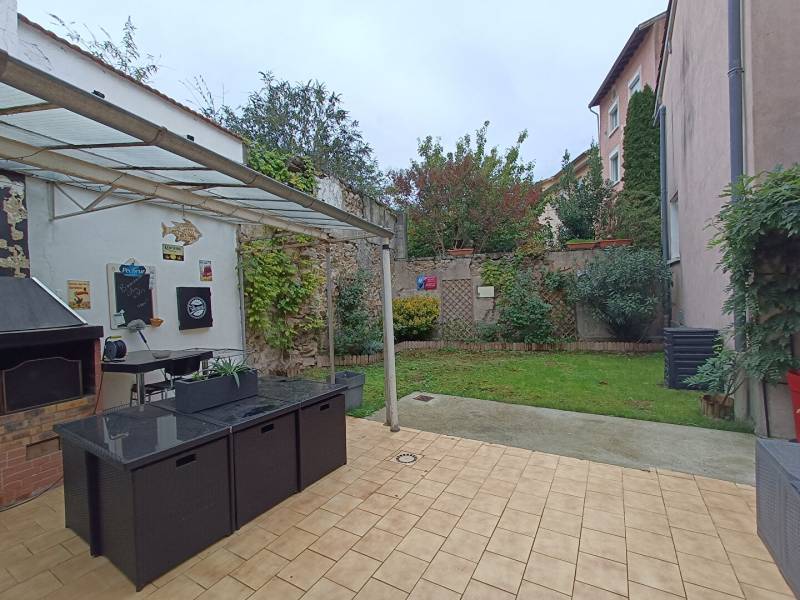 Maison de ville T3 94 m² avec jardin et garage à Pont-Evêque